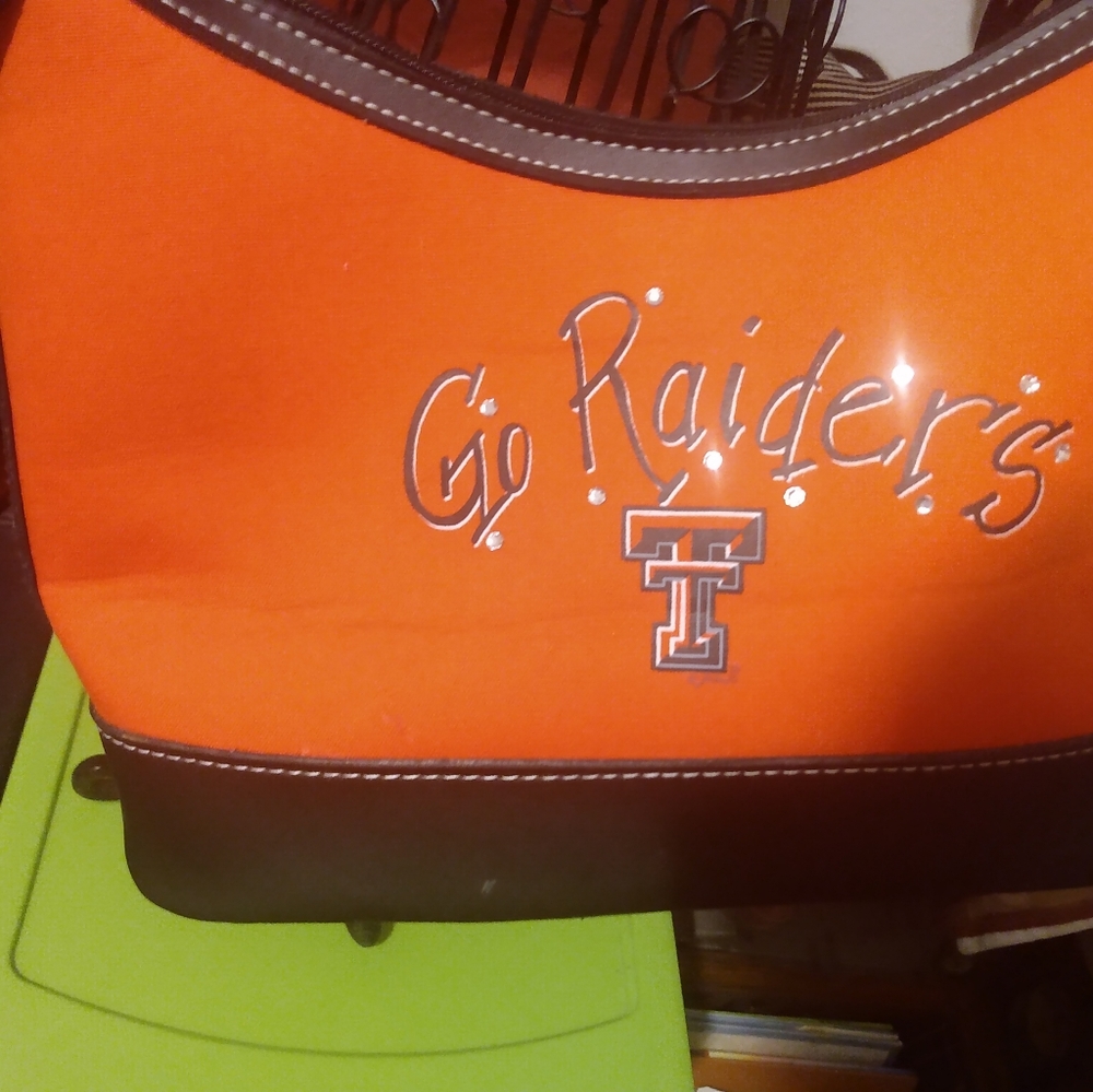 Texas Tech red raiders NWT ladies purse.